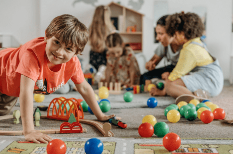 a group of children playing with toys